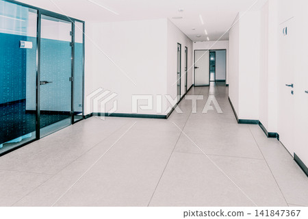 Empty bright corridor of hospital clinic, waiting room space lobby for patients Empty bright corridor of hospital clinic, waiting room space lobby for patients 141847367