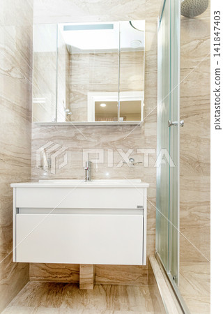 Simple bathroom interior in residential building, toilet design hotel apartment Simple bathroom interior in residential building, toilet design hotel apartment 141847403