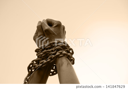 Arms Bounded with iron chain Arms Bounded with iron chain 141847629