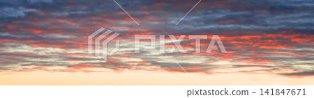Bright clouds in the evening sky Bright clouds in the evening sky 141847671