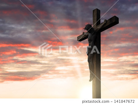 Crucified Christ hangs on the cross Crucified Christ hangs on the cross 141847672
