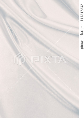 Smooth elegant grey silk or satin luxury cloth as wedding background. Luxurious background design Smooth elegant grey silk or satin luxury cloth as wedding background. Luxurious background design 141847832