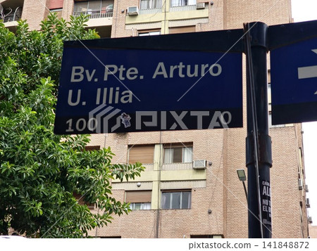 Cordoba, Argentina - April 13, 2026: Bv. Pte. Arturo U. Illia street sign in Cordoba Cordoba, Argentina - April 13, 2026: Bv. Pte. Arturo U. Illia street sign in Cordoba 141848872