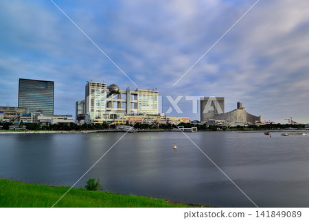 A long-exposure shot of the view of Odaiba Seaside Park from Daiba Park. A long-exposure shot of the view of Odaiba Seaside Park from Daiba Park. 141849089