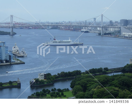 A view of the Ogasawara Maru and the Rainbow Bridge. A view of the Ogasawara Maru and the Rainbow Bridge. 141849336