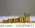 Finance, gold trading is in an uptrend, gold coin trend chart shows an upward trend. 141850621