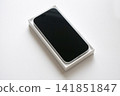 A brand new smartphone in a box 141851847