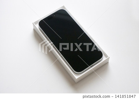 A brand new smartphone in a box A brand new smartphone in a box 141851847