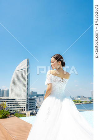 The bride and groom under the blue sky The bride and groom under the blue sky 141852673