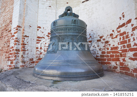 Historic Bronze Bell Cast in 1865 with Cyrillic Inscription and Religious Reliefs at Goritsky Monastery in Pereslavl-Zalessky, Russia Historic Bronze Bell Cast in 1865 with Cyrillic Inscription and Religious Reliefs at Goritsky Monastery in Pereslavl-Zalessky, Russia 141855251