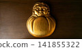 Golden Daruma doll from the early Showa period 141855322
