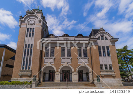 Front view of Koriyama City Public Hall against a blue sky [Fumotoyama, Koriyama City, Fukushima Prefecture] 141855349