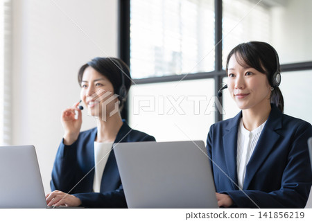 Businesswoman talking on income Businesswoman talking on income 141856219