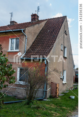 Old Prussian residential building with tiled roof in Gvardeysk, Russia Old Prussian residential building with tiled roof in Gvardeysk, Russia 141856336