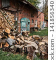 Old red brick outbuilding in a Russian village 141856340