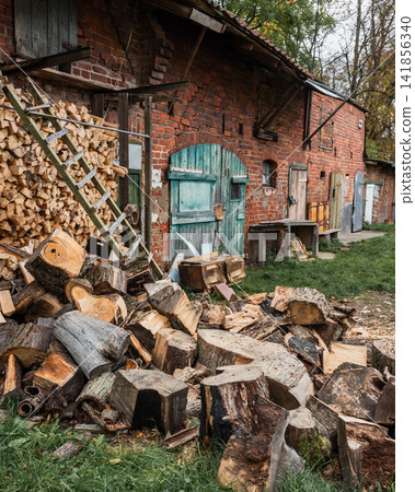 Old red brick outbuilding in a Russian village Old red brick outbuilding in a Russian village 141856340