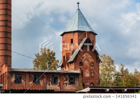 Historic red brick tower of former psychiatric hospital in Gvardeysk, Kaliningrad Oblast. Russia Historic red brick tower of former psychiatric hospital in Gvardeysk, Kaliningrad Oblast. Russia 141856341
