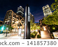 The Azabudai Hills in Minato, Tokyo, Japan, a complex of Azabudai Hills Mori JP Tower, Azabudai Hills Residence A and B, and the shopping buildings of the Garden Plaza. 141857380