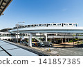 View of a New Transit Yurikamome line train running on the elevated track in Koto, Tokyo, Japan. It's an automated guideway transit service in Tokyo. 141857385