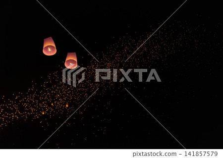 Enchanting Sky Lanterns in Yi-Peng Festival, Chiang Mai Thailand. Enchanting Sky Lanterns in Yi-Peng Festival, Chiang Mai Thailand. 141857579