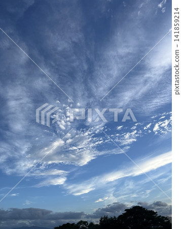 Cloud spreading in the blue sky 141859214