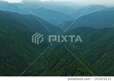 Aerial photograph capturing the mountain valley and landslide site in Otani-kuzure, Shizuoka Prefecture. Aerial photograph capturing the mountain valley and landslide site in Otani-kuzure, Shizuoka Prefecture. 141859231