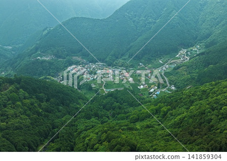 Aerial photograph overlooking the terraced fields of the Utogi settlement in Shizuoka City, Shizuoka Prefecture. Aerial photograph overlooking the terraced fields of the Utogi settlement in Shizuoka City, Shizuoka Prefecture. 141859304