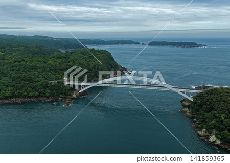 An aerial photograph overlooking the arch bridge and strait in Kushimoto Town, Wakayama Prefecture. An aerial photograph overlooking the arch bridge and strait in Kushimoto Town, Wakayama Prefecture. 141859365