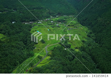 Aerial photograph capturing the terraced rice fields and mountain ranges of Kumano City, Mie Prefecture. Aerial photograph capturing the terraced rice fields and mountain ranges of Kumano City, Mie Prefecture. 141859414