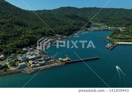 Aerial photograph of the port and breakwater in Yura Town, Wakayama Prefecture. Aerial photograph of the port and breakwater in Yura Town, Wakayama Prefecture. 141859443