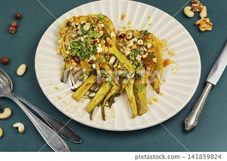 Plant Based Roasted Fennel with Mixed Nuts and Aromatic Herbs 141859824