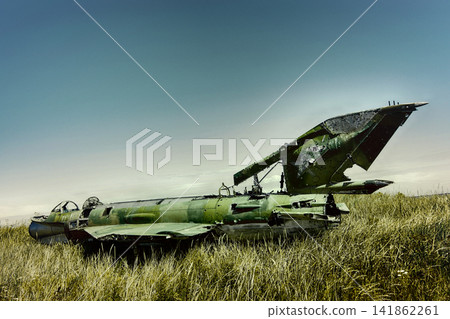 war plane crashed on shore of sea several years ago and lies on dunes war plane crashed on shore of sea several years ago and lies on dunes 141862261