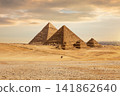 Stunning View of Giza Pyramids in Egypt Desert at Sunset 141862640