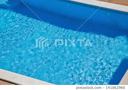 Modern swimming pool edge. Modern swimming pool edge. 141862960