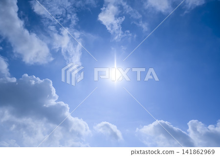 August blue sky, sun, and white clouds - Summer sky background material August blue sky, sun, and white clouds - Summer sky background material 141862969