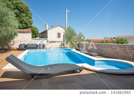 Luxury vacation villa pool with traditional stone house. Istria, Croatia. Luxury vacation villa pool with traditional stone house. Istria, Croatia. 141862992