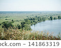 Panoramic summer landscape of the Kama River, with meadows and green trees on the bank. 141863319