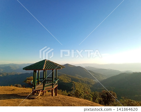 Beautiful landscape of resting pavilion along the path up the mountain in Thailand. Valley hill of Doi Puico moutain view point at Mea Hong Son province of Thailand Beautiful landscape of resting pavilion along the path up the mountain in Thailand. Valley hill of Doi Puico moutain view point at Mea Hong Son province of Thailand 141864620