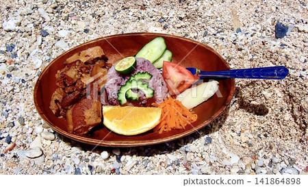 Lunch plate featuring Okinawan ingredients such as Tebichi and Mooi. Lunch plate featuring Okinawan ingredients such as Tebichi and Mooi. 141864898