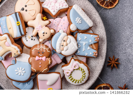 Gingerbread as a Christmas staple, sweet biscuits for the holiday. Gingerbread as a background 141866282