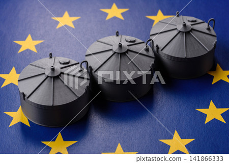 Liquefied gas storage tanks set against the EU flag as a background for your design Liquefied gas storage tanks set against the EU flag as a background for your design 141866333