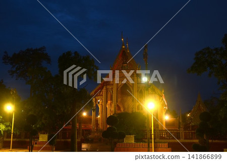 wat Pradu royal monastery Thai temple with electric lamp in night wat Pradu royal monastery Thai temple with electric lamp in night 141866899