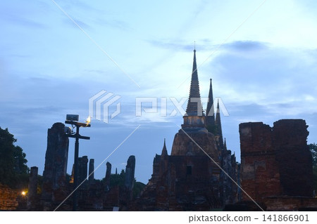 pagoda of Wat Phra Si Sanphet or temple of the holy, splendid Omniscient in twilight sunset sky background on evening pagoda of Wat Phra Si Sanphet or temple of the holy, splendid Omniscient in twilight sunset sky background on evening 141866901