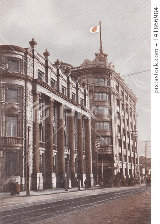 Vintage photograph, 1923-1933, Osaka City: Mitsui Bank Osaka Branch (foreground) and Mitsukoshi Osaka Store (background) in Kitahama. Vintage photograph, 1923-1933, Osaka City: Mitsui Bank Osaka Branch (foreground) and Mitsukoshi Osaka Store (background) in Kitahama. 141866984