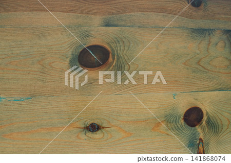 Horizontal wooden plank texture background with natural pine grain and distinct dark knots for rustic interior design backdrop and vintage timber surface concept Horizontal wooden plank texture background with natural pine grain and distinct dark knots for rustic interior design backdrop and vintage timber surface concept 141868074