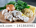 Fresh Homemade Pasta Ingredients with Mushrooms and Greens 141868981