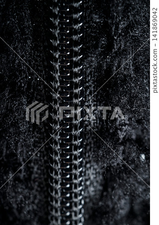 Zipper on black fleece background close-up Zipper on black fleece background close-up 141869042