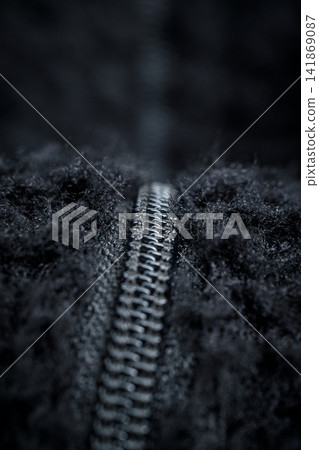 Zipper on black fleece background close-up Zipper on black fleece background close-up 141869087