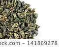 Green oolong tea closeup with white backdrop Green oolong tea closeup with white backdrop 141869278