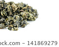 Aromatic Tie Guan Yin detail on clean white backdrop Aromatic Tie Guan Yin detail on clean white backdrop 141869279